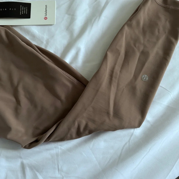 🆕🤎 Lululemon Asia Fit Wunder Train HR Tight 24” Hem Slit - Tauptastic Tan - Picture 3 of 14
